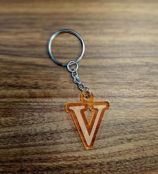 stylized "v" keychain