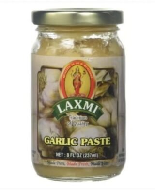Laxmi Garlic Paste in a jar, perfect for enhancing flavors in cooking.
