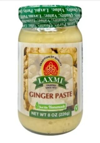 Laxmi Ginger Paste 8 Oz jar with a vibrant label showcasing authentic ginger flavor.
